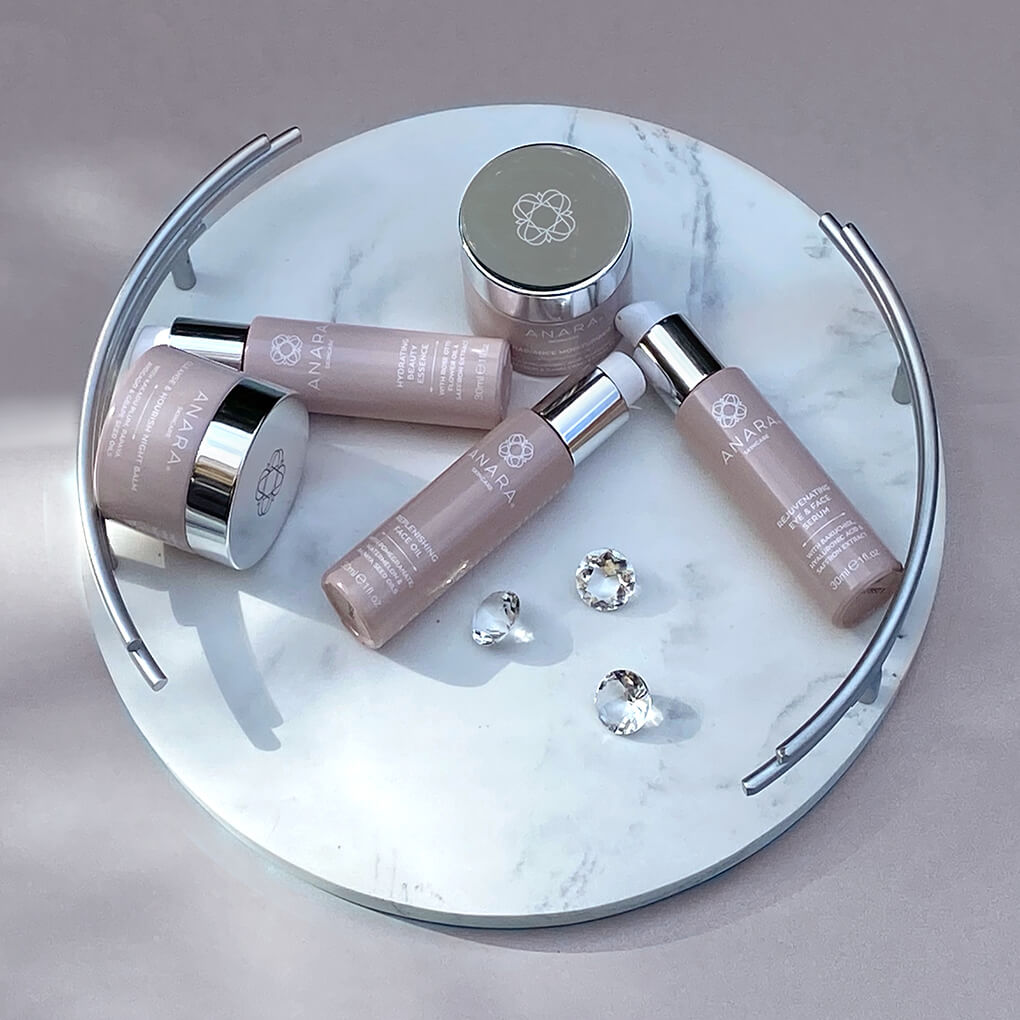 Anara Skincare products shown on a marble tray. 