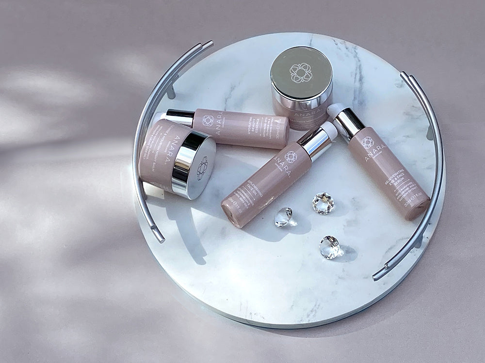 The Anara Skincare range on a white marble tray