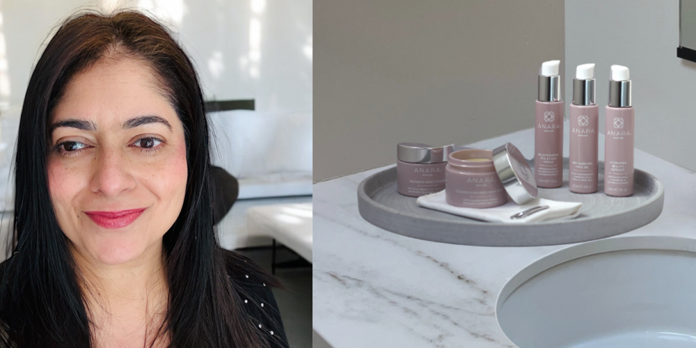Arati founder of Anara and the Anara Skincare range on a grey tray in a bathroom