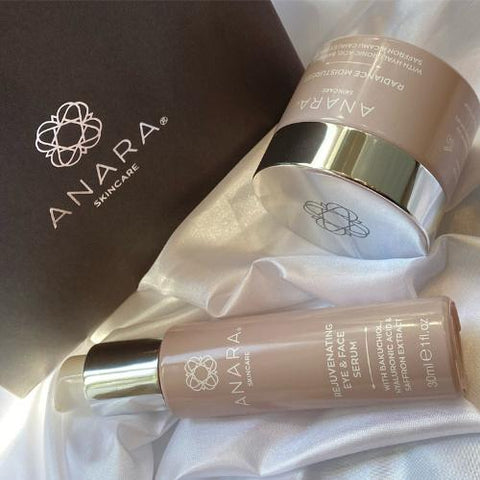 Anara Radiance Moisturiser & Rejuvenating Eye & Face Serum with gift box on white satin material