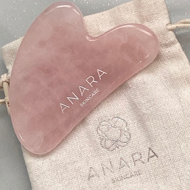 
                  
                    Anara Skincare Rose Quartz Gua Sha on Anara cream cotton pouch
                  
                