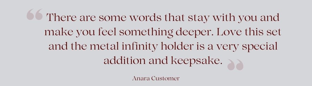 Customer review quote about Anara Kindlings motivational cards and the metal infinity holder on a light grey background