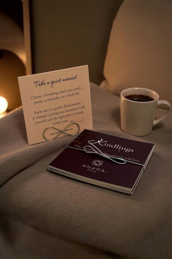 Anara Kindlings positivity cards with black coffee on sofa