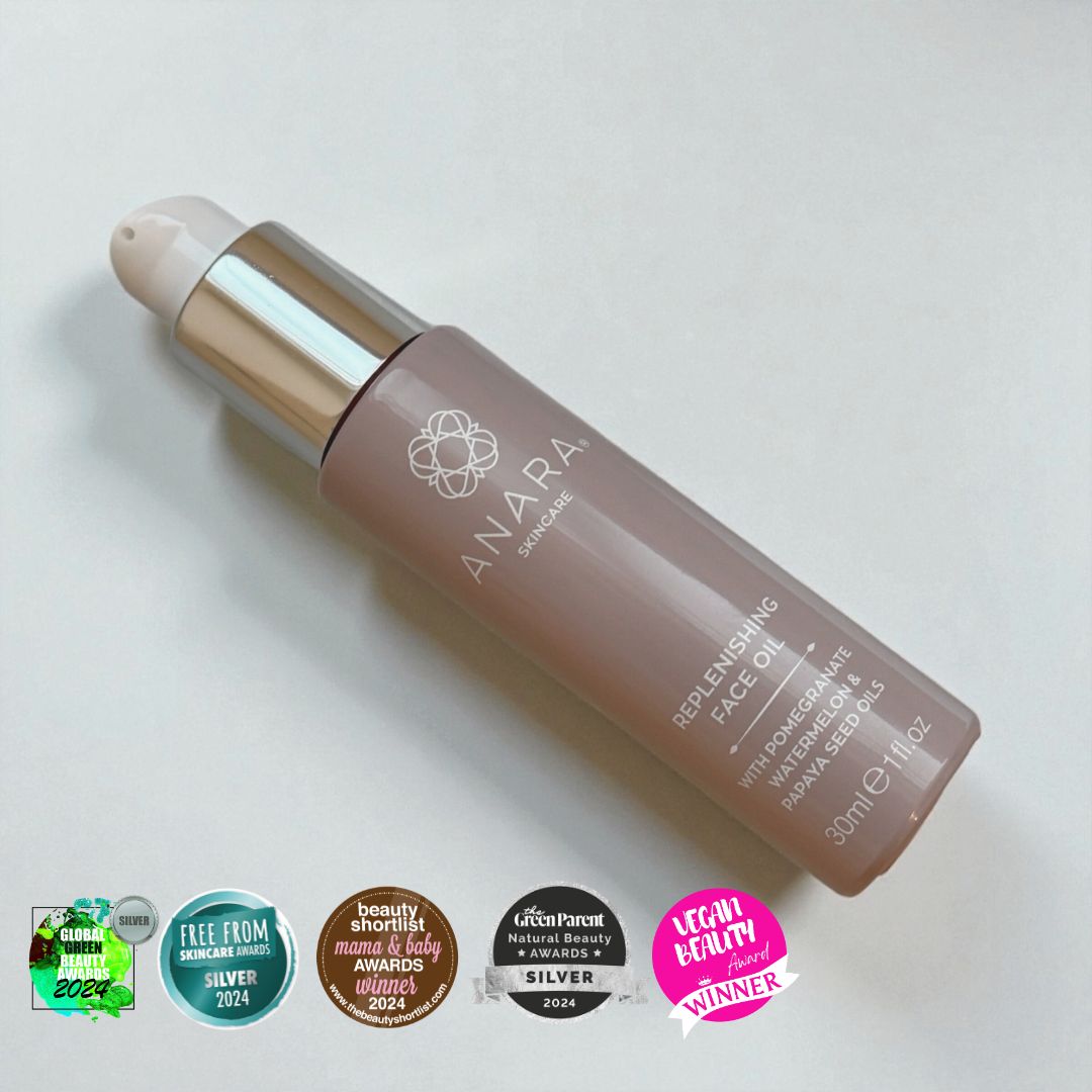 Anara Skincare Replenishing Face Oil bottle with awards on a light grey background