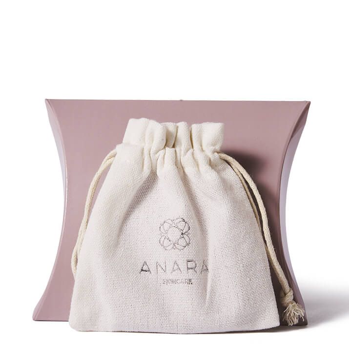 The Anara Rose Quartz Gua Sha cotton pouch and outer carton