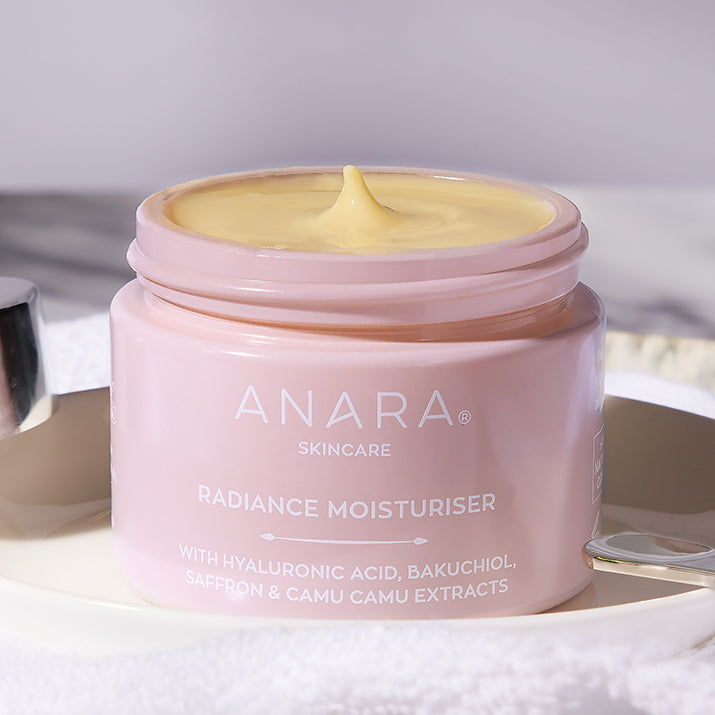 
                  
                    Anara Radiance Moisturiser jar with lid removed to reveal texture
                  
                