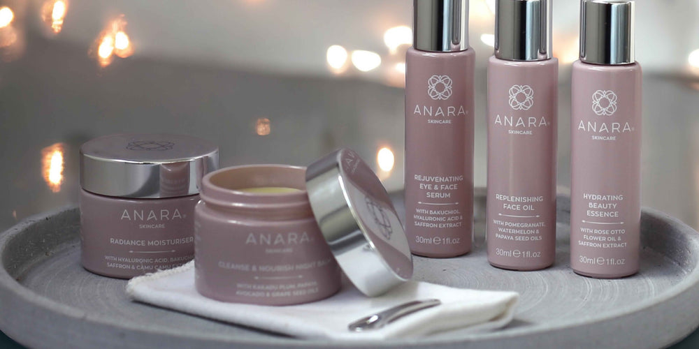 Anara skincare products on a tray with a soft, blurred background