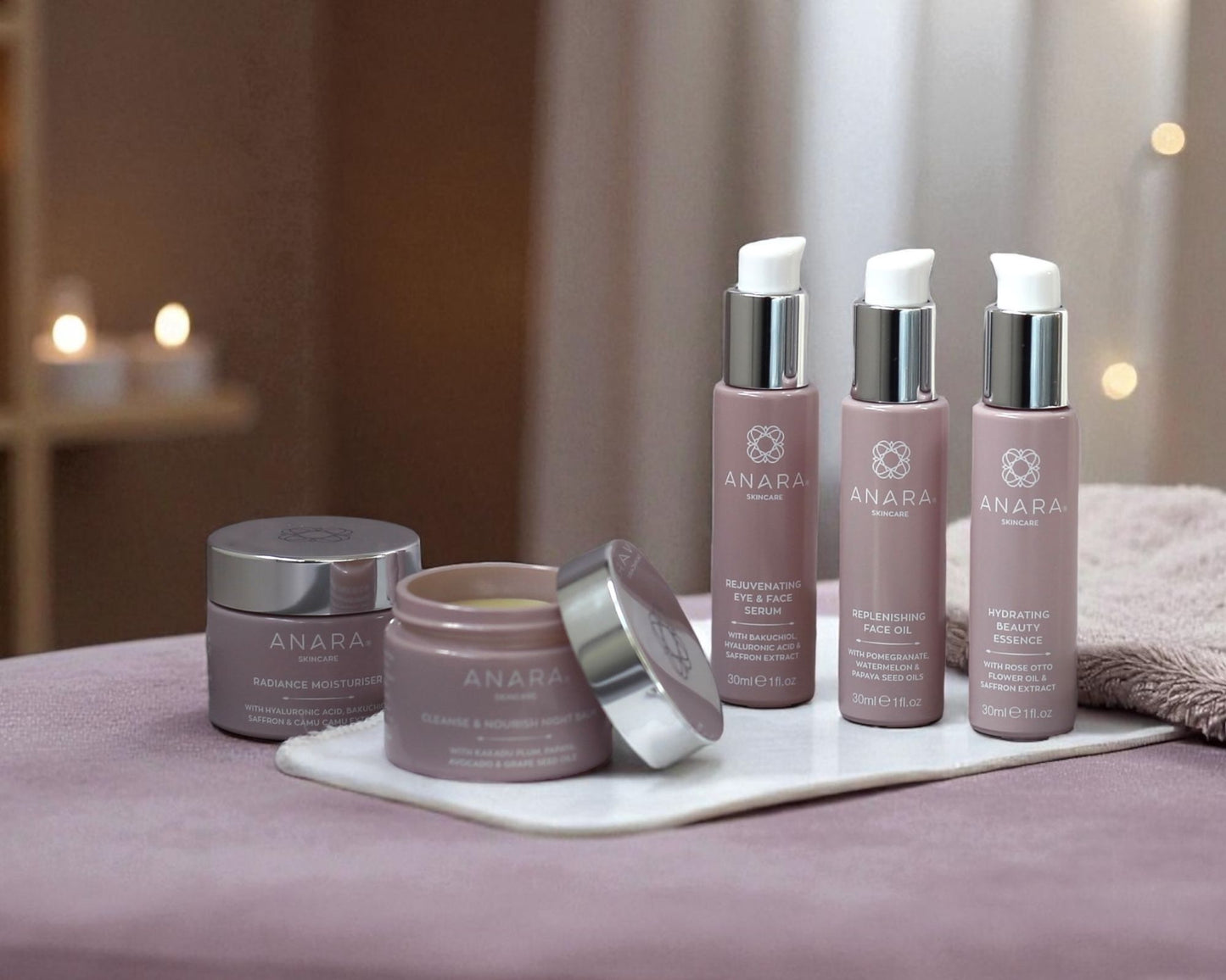 Anara skincare products on a table with  a mauve surface and a blurred light filled background
