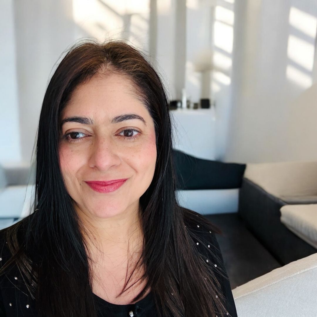 Founder, Arati in a light filled living room