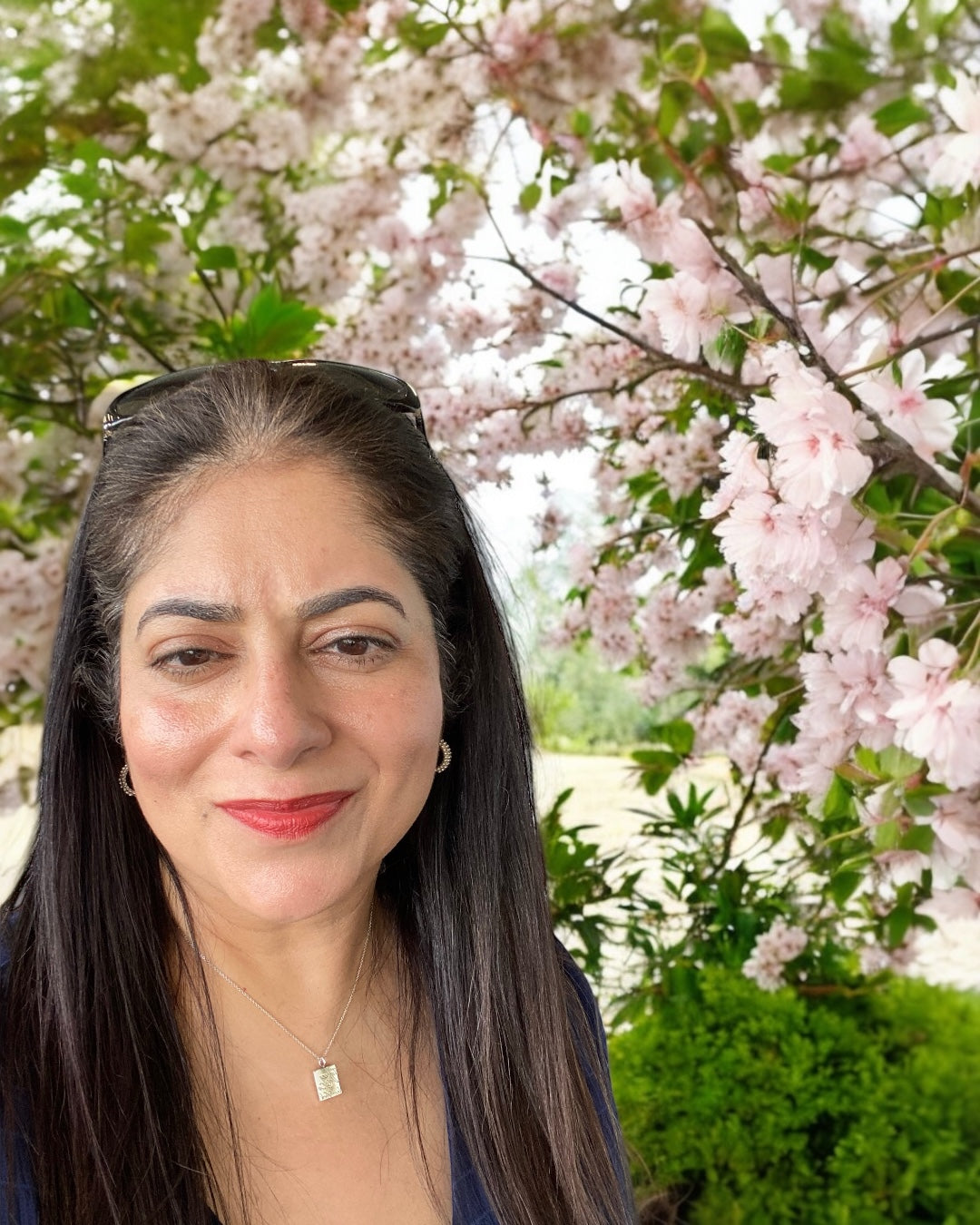 Arati in the park surrounded by blossom