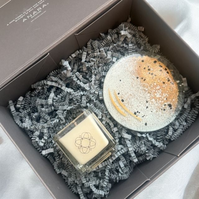 Anara Skincare square candle with round Eratini fused glass plate inside gift box