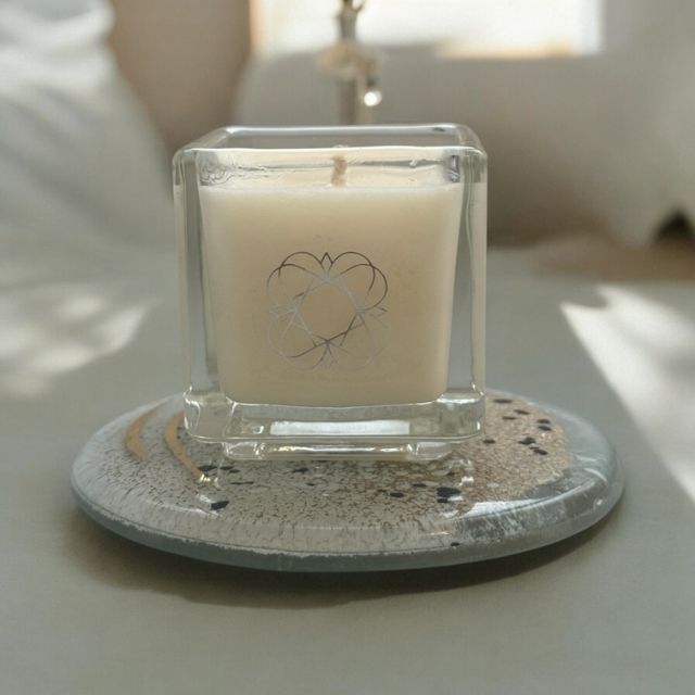 
                  
                    Anara Skincare square candle on round Eratini fused glass plate 
                  
                