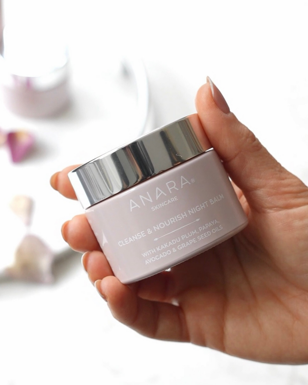 Anara Skincare Cleanse & Nourish Night Balm in hand