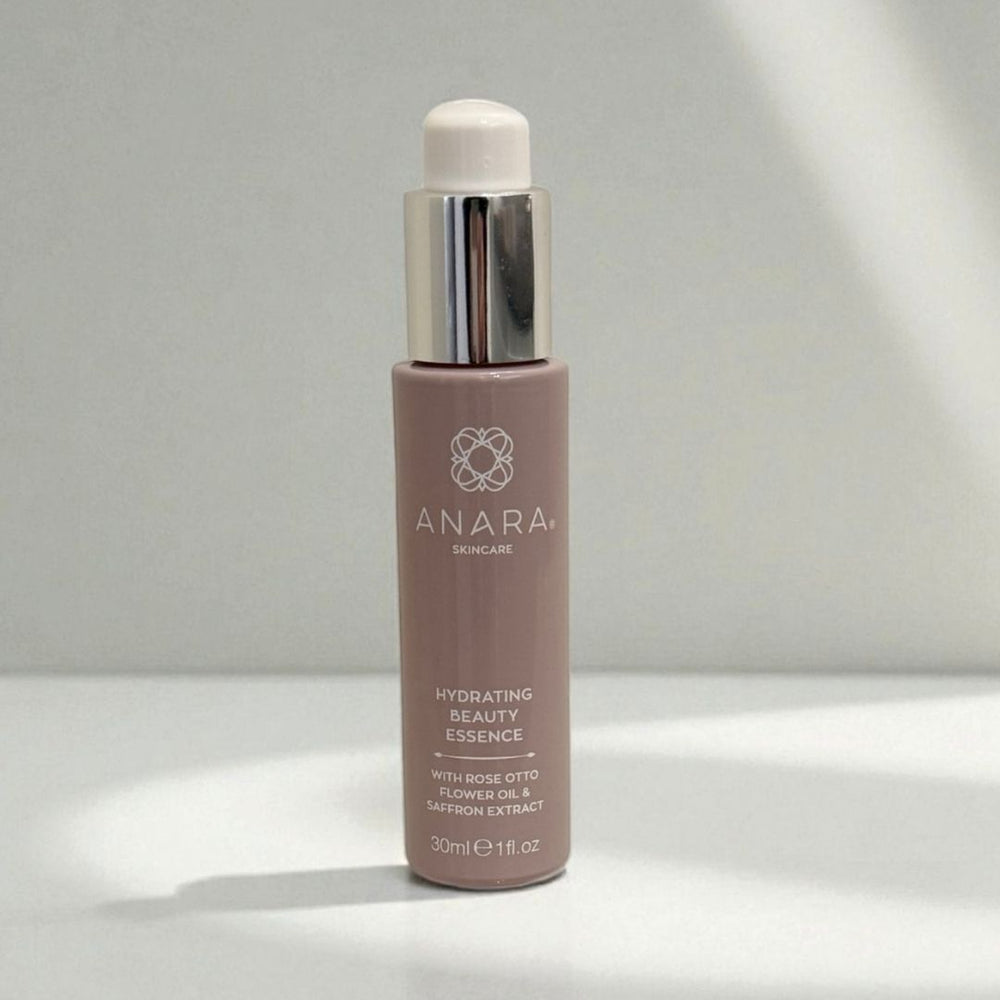 Anara Skincare Hydrating Beauty Essence bottle on a neutral background with light