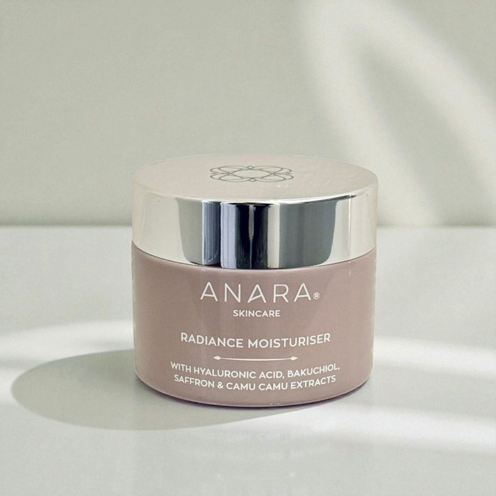 Anara Skincare Radiance Moisturiser jar on a neutral background with light