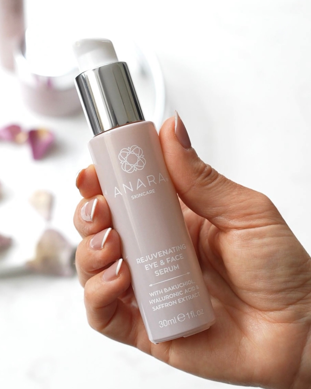 
                  
                    Anara Skincare Rejuvenating Eye & Face Serum in hand
                  
                