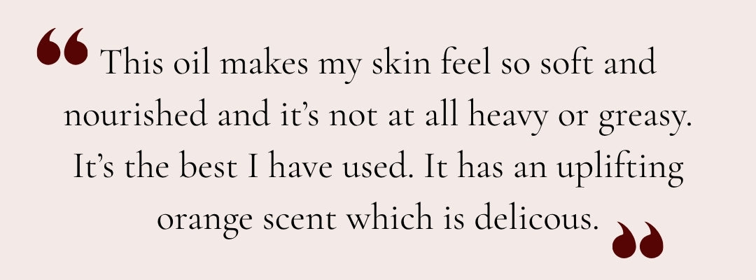 A review of Replenishing Face Oil on a light pink background. 'This oil makes my skin feel so soft and nourished and it's not at all heavy or greasy. It's the best I have used.