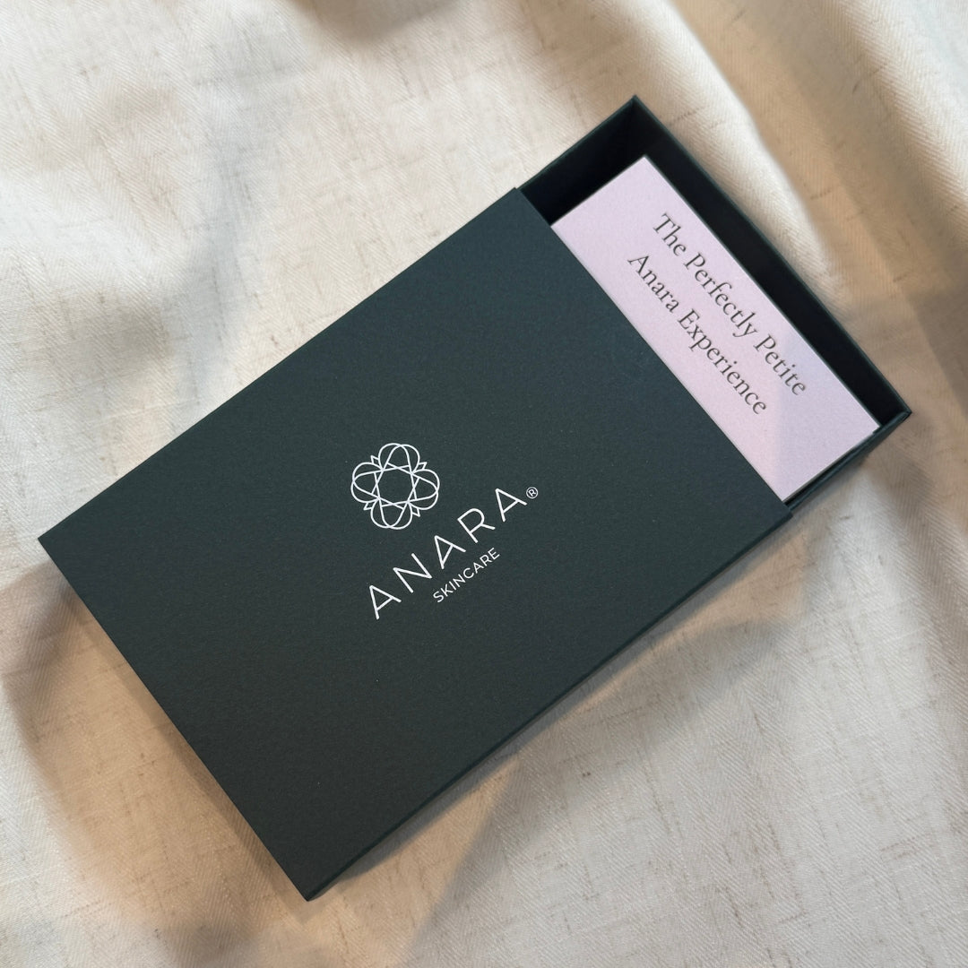 
                  
                    Green Anara gift box with card showing saying The Perfectly Petite Anara Experience.
                  
                